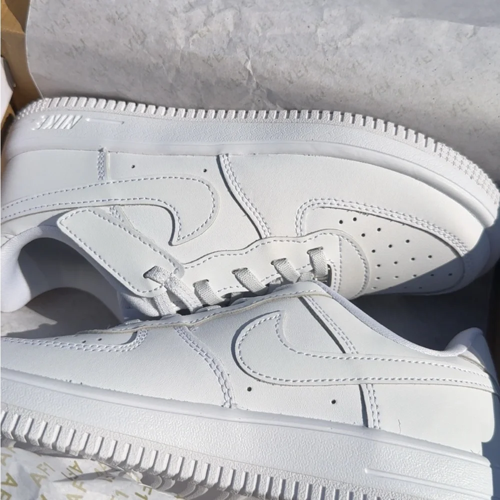 Nike Women’s White Low-Top Leather Sneakers